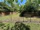Fenced backyard with lawn, offering a secure and private outdoor space at 1453 Reagan Cir, Conyers, GA 30012