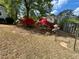 Backyard features colorful azaleas, mature landscaping, and an inviting outdoor space at 1453 Reagan Cir, Conyers, GA 30012
