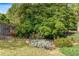 Landscaped backyard garden with a variety of plants and trees at 1453 Reagan Cir, Conyers, GA 30012
