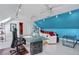 Bonus room with colorful mural, sofa and desk, perfect for a creative space at 1453 Reagan Cir, Conyers, GA 30012