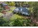A partial aerial view of the rear exterior showcasing the home's deck and landscaped backyard at 1453 Reagan Cir, Conyers, GA 30012