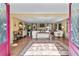 View from the front doorway of a spacious foyer leading into a large living room at 1453 Reagan Cir, Conyers, GA 30012