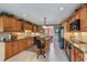 Spacious kitchen with granite countertops, stainless steel appliances, and ample cabinet space at 1453 Reagan Cir, Conyers, GA 30012