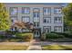 Beautiful facade showcasing a classic condo building with brick accents and lush greenery at 3 Park Ne Ln # H, Atlanta, GA 30309