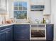 Kitchen featuring stainless steel oven and microwave, granite countertops, and large window at 3 Park Ne Ln # H, Atlanta, GA 30309