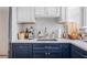 Close-up of kitchen sink area with granite countertops and modern appliances at 3 Park Ne Ln # H, Atlanta, GA 30309