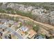 Overhead view of a home near a golf course highlighting the property's location in a residential community at 3835 Greenside Ct, Dacula, GA 30019