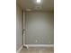 Finished basement with tile flooring, clean design, and utility access at 3835 Greenside Ct, Dacula, GA 30019