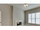 Bedroom with neutral carpet, a fireplace, and a window with blinds at 3835 Greenside Ct, Dacula, GA 30019