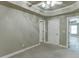 Spacious bedroom with neutral carpeting and doorway access, offering a comfortable living space at 3835 Greenside Ct, Dacula, GA 30019
