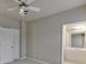Neutral bedroom with a ceiling fan and ensuite bathroom access, perfect for privacy and convenience at 3835 Greenside Ct, Dacula, GA 30019