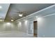 Expansive bonus room featuring dual ceiling fans and recessed lights for added convenience at 3835 Greenside Ct, Dacula, GA 30019