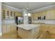 Kitchen showcasing a large island, stainless steel appliances, and light wood cabinetry at 3835 Greenside Ct, Dacula, GA 30019
