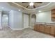 Open-concept kitchen with ceiling fan, ample counter space, tile flooring at 3835 Greenside Ct, Dacula, GA 30019