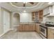 Bright kitchen featuring stainless steel oven, countertops, and cabinets at 3835 Greenside Ct, Dacula, GA 30019