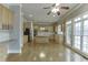 Bright, open kitchen with a large island, light wood cabinets, and stainless steel appliances at 3835 Greenside Ct, Dacula, GA 30019