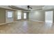 Living room with tile floors, ceiling fan, recessed lighting, and natural light at 3835 Greenside Ct, Dacula, GA 30019