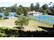 Well-maintained tennis courts in a beautiful community setting with lush greenery at 3835 Greenside Ct, Dacula, GA 30019