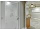Charming wine cellar with decorative glass door at 3835 Greenside Ct, Dacula, GA 30019