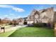 Attractive brick-front home with a manicured lawn, spacious driveway, and convenient two-car garage at 5466 Vinings Lake Way, Mableton, GA 30126
