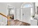 Bright entryway with wood floors and a view to another room at 5466 Vinings Lake Way, Mableton, GA 30126