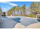 Expansive covered community pool with nearby cabana, surrounded by trees, offering residents a resort-like experience at 5466 Vinings Lake Way, Mableton, GA 30126