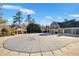 A large, covered community pool near an outdoor gazebo offers a relaxing retreat within a beautifully landscaped setting at 5466 Vinings Lake Way, Mableton, GA 30126