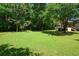 Large, grassy backyard providing ample space for recreation and enjoying the outdoors at 2116 Strasburg Ct, Dunwoody, GA 30338