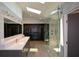 Bathroom with double vanity, large mirror, skylight and large glass-enclosed shower at 2116 Strasburg Ct, Dunwoody, GA 30338