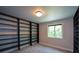 Spacious walk-in closet with built-in shelving and natural light from the window at 2116 Strasburg Ct, Dunwoody, GA 30338