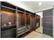 Spacious walk-in closet with custom built-ins and ample storage space at 2116 Strasburg Ct, Dunwoody, GA 30338