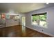 Bright living room with hardwood floors and access to the backyard through sliding doors at 2116 Strasburg Ct, Dunwoody, GA 30338