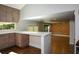 Bright living room with hardwood floors and access to kitchen counter and outdoors via sliding doors at 2116 Strasburg Ct, Dunwoody, GA 30338