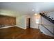 Open living room features hardwood floors, staircase, and modern design at 2116 Strasburg Ct, Dunwoody, GA 30338