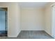 The bedroom features modern carpet, a sliding glass door and neutral paint at 2916 Lloyd Rd, Decatur, GA 30034