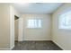 This bedroom offers plenty of closet space, neutral paint and a window for natural light at 2916 Lloyd Rd, Decatur, GA 30034