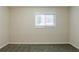 This bedroom features neutral walls, plush carpeting and a window offering natural light at 2916 Lloyd Rd, Decatur, GA 30034