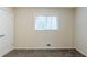 Bedroom with neutral walls, carpeted floor, and a window allowing for ample natural light at 2916 Lloyd Rd, Decatur, GA 30034