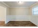 Inviting dining area with hardwood floors and wainscoting detail that offers a welcoming space for gatherings at 2916 Lloyd Rd, Decatur, GA 30034