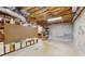 Unfinished basement with exposed ceiling and concrete walls, offering potential for customization at 3242 Inns Brook Way, Snellville, GA 30039
