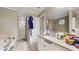 A beautiful bathroom with a soaking tub, shower, vanity, and tile flooring at 3242 Inns Brook Way, Snellville, GA 30039