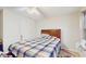 This bedroom has a comfortable bed, fan and plenty of natural light at 3242 Inns Brook Way, Snellville, GA 30039