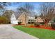 Well-manicured lawn and landscaping lead to this charming two-story home with attached two-car garage at 3242 Inns Brook Way, Snellville, GA 30039