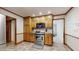Functional kitchen with stainless steel oven and microwave, wood cabinets, and tile flooring at 3242 Inns Brook Way, Snellville, GA 30039