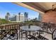 Relaxing balcony area with outdoor seating and city views at 77 Peachtree Ne Pl # 402, Atlanta, GA 30309