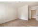 Spacious bedroom with hardwood floors, crown molding, and neutral paint scheme at 77 Peachtree Ne Pl # 402, Atlanta, GA 30309