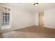 Well-lit bedroom with hardwood floors and access to an outdoor space at 77 Peachtree Ne Pl # 402, Atlanta, GA 30309