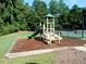 Community playground with slide and climbing structure at 1115 Harvest Brook Ne Way, Lawrenceville, GA 30043
