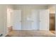 This bedroom features neutral walls, plush carpeting, and convenient access to other rooms at 2504 Brentwood Rd, Decatur, GA 30032