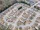An aerial view shows the home nestled in a community with manicured lawns and mature trees at 46 Darbys Crossing Ct, Hiram, GA 30141